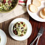 Cranberry Feta Brussels Sprout Salad with Candied Pecans and Warm Bacon Vinaigrette
