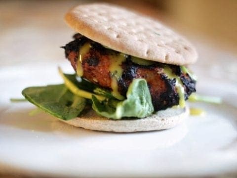 A BBQ turkey burger on a white plate