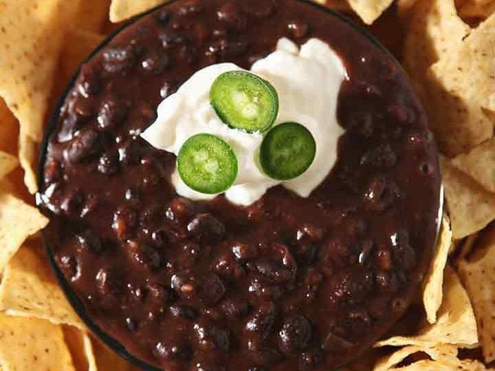Close up of Black Bean Dip, garnished and ready for dipping