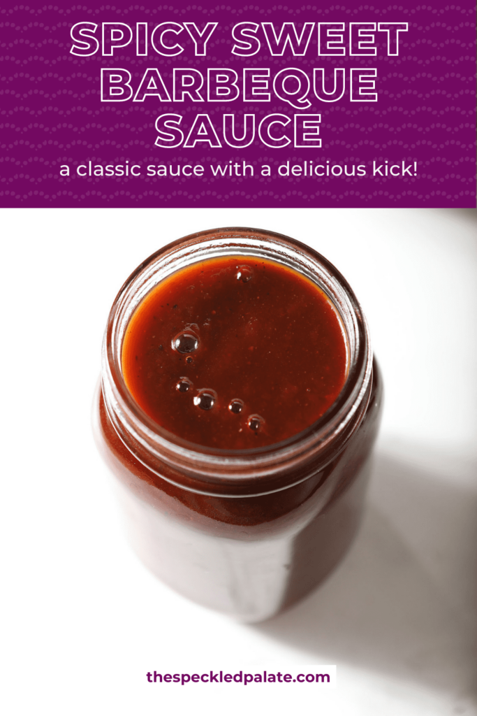 A reddish sauce in a jar with bubbles on top with the text Spicy Sweet Barbecue Sauce a classic sauce with a delicious kick