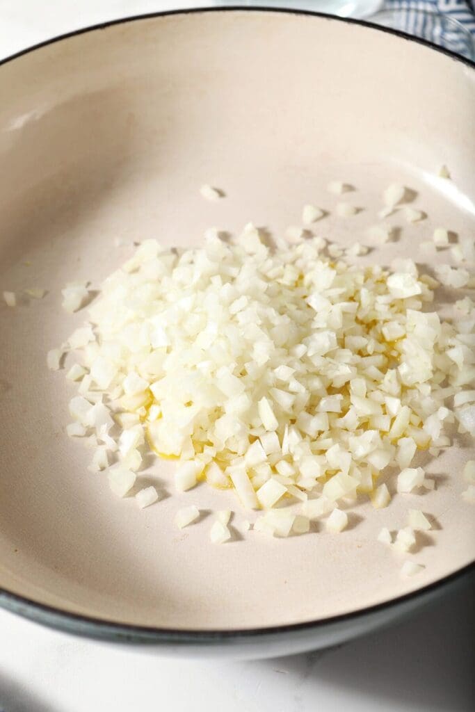 Onion and garlic in a pan with oil