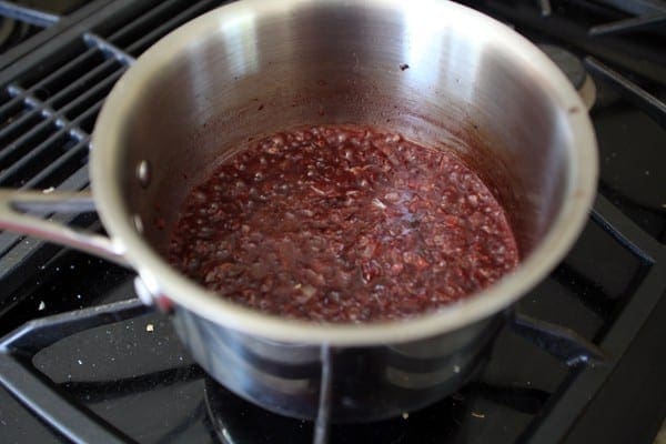 Wine sauce in pot on stovetop 