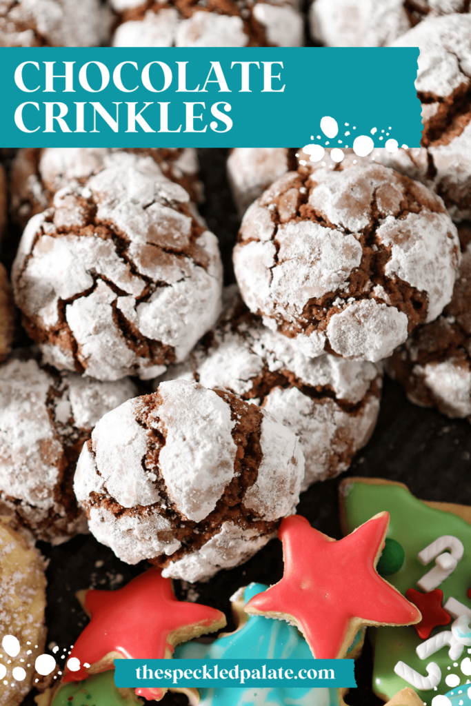 Close up of crinkle cookies on a tray with the text chocolate crinkles