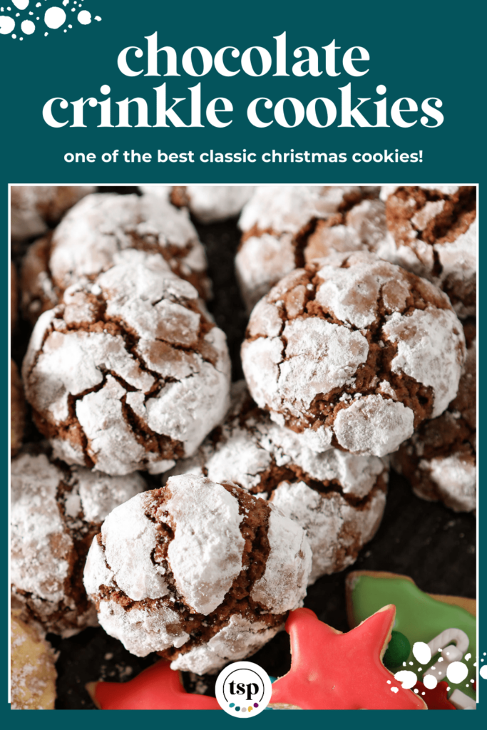 Close up of chocolate crinkles on a tray with the text chocolate crinkle cookies one of the best christmas cookies!