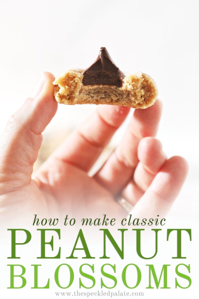 A hand holds a bitten-into Peanut Blossom Cookie with the text 'how to make classic peanut blossoms'