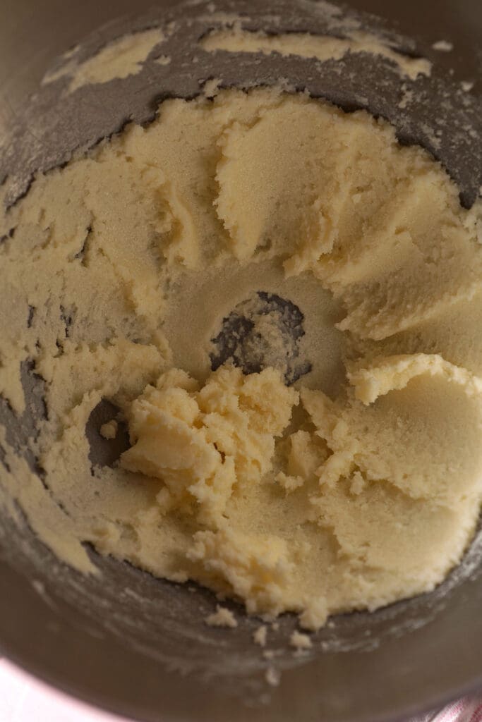 creamed butter and sugar in a metal bowl