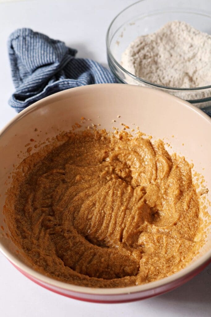 Wet ingredients for pumpkin cookies blended together in a bowl