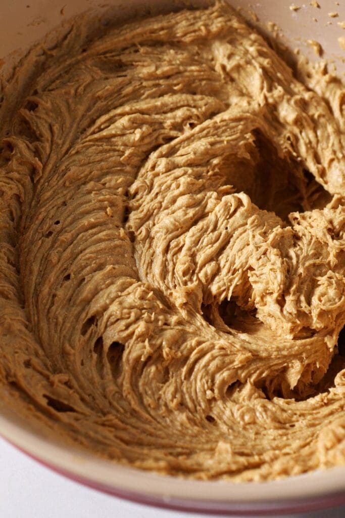 Pumpkin drop cookie batter in a bowl before scooping