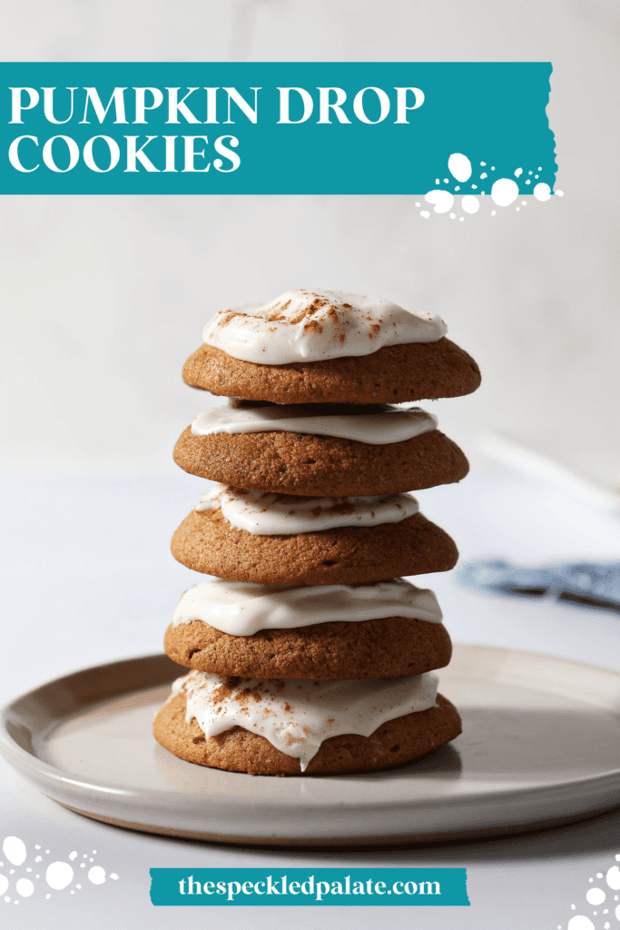 A stack of cookies frosted with cream cheese icing on a plate with the text pumpkin drop cookies