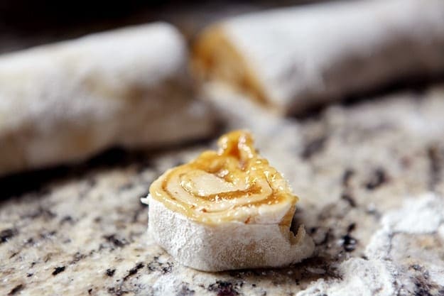 Close up of Fig Pinwheel cookie on a granite countertop 