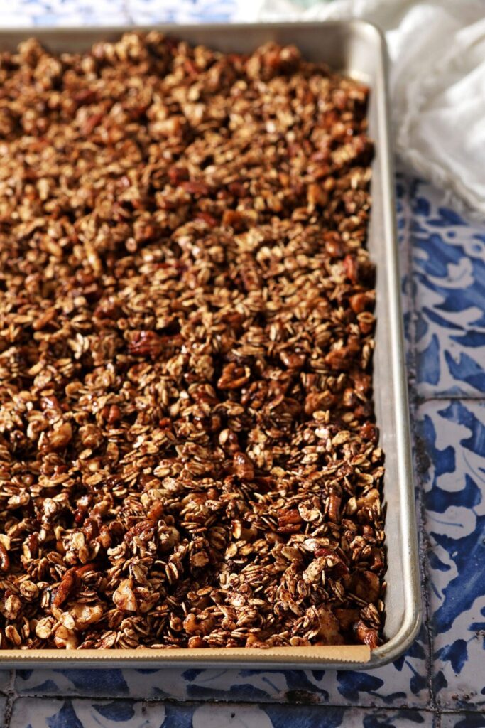 A sheet pan of granola before baking