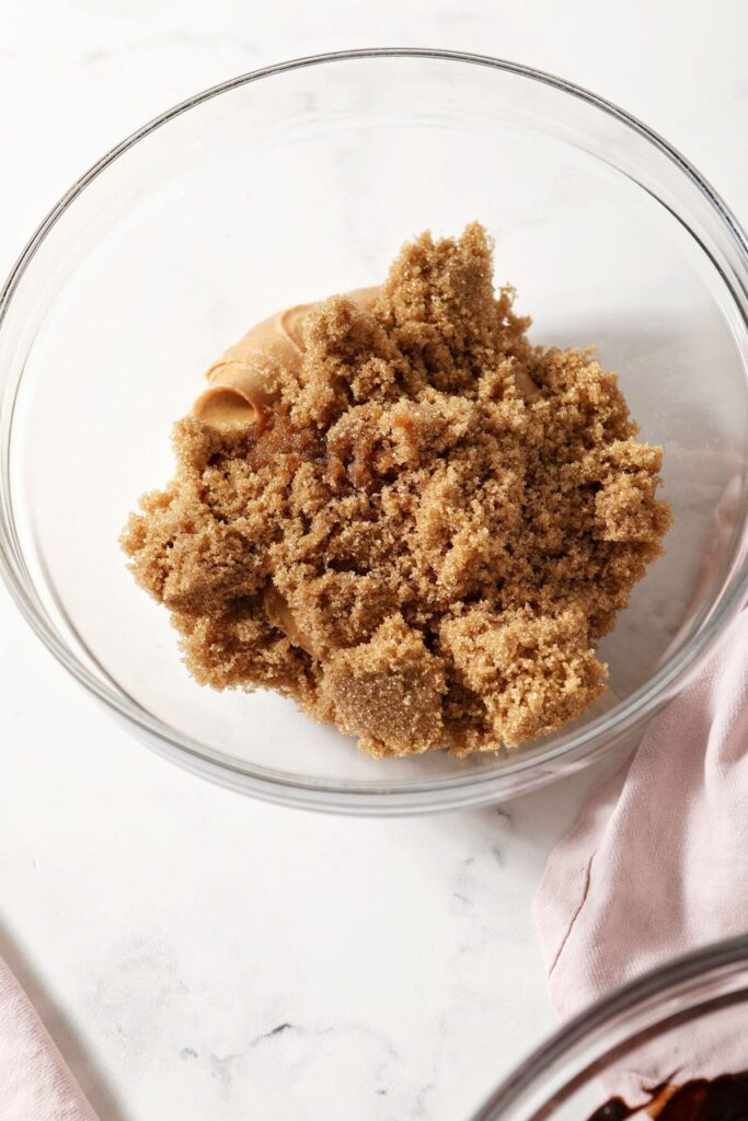 Closeup of peanut butter filling in a bowl on marble