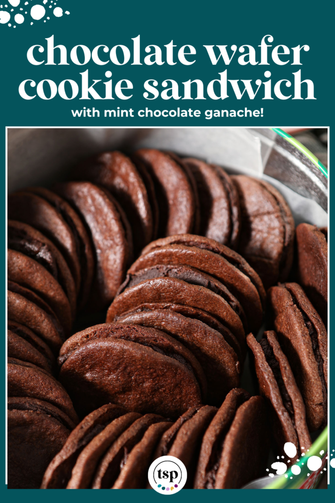 Cocoa Wafer Sandwich Cookies with Mint Chocolate Ganache in a cookie tin with the text chocolate wafer cookie sandwich with mint chocolate ganache