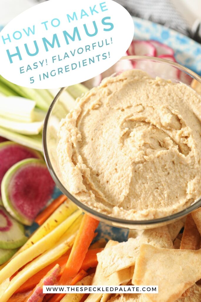 Close up of hummus dip in a clear glass bowl surrounded by veggie slices, with text stating "How to Make Hummus: Easy! Flavorful! 5 ingredients!"