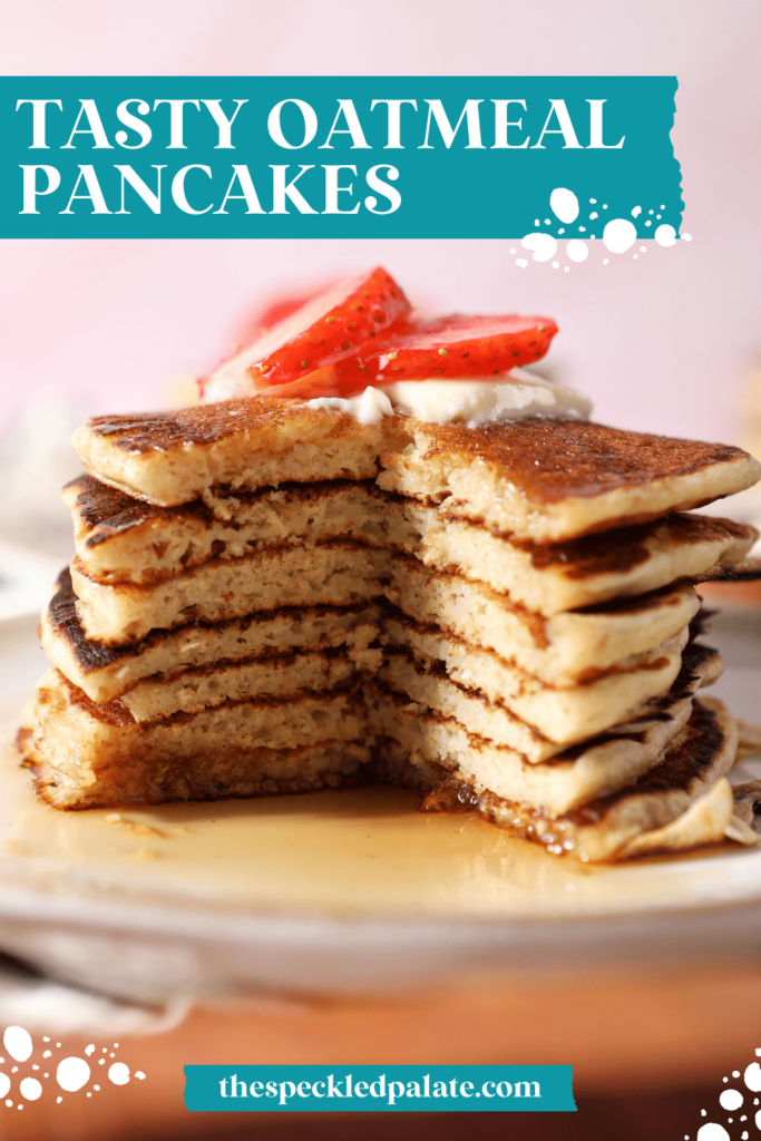 Close up of a cut-into stack of pancakes topped with strawberries with the text tasty oatmeal pancakes