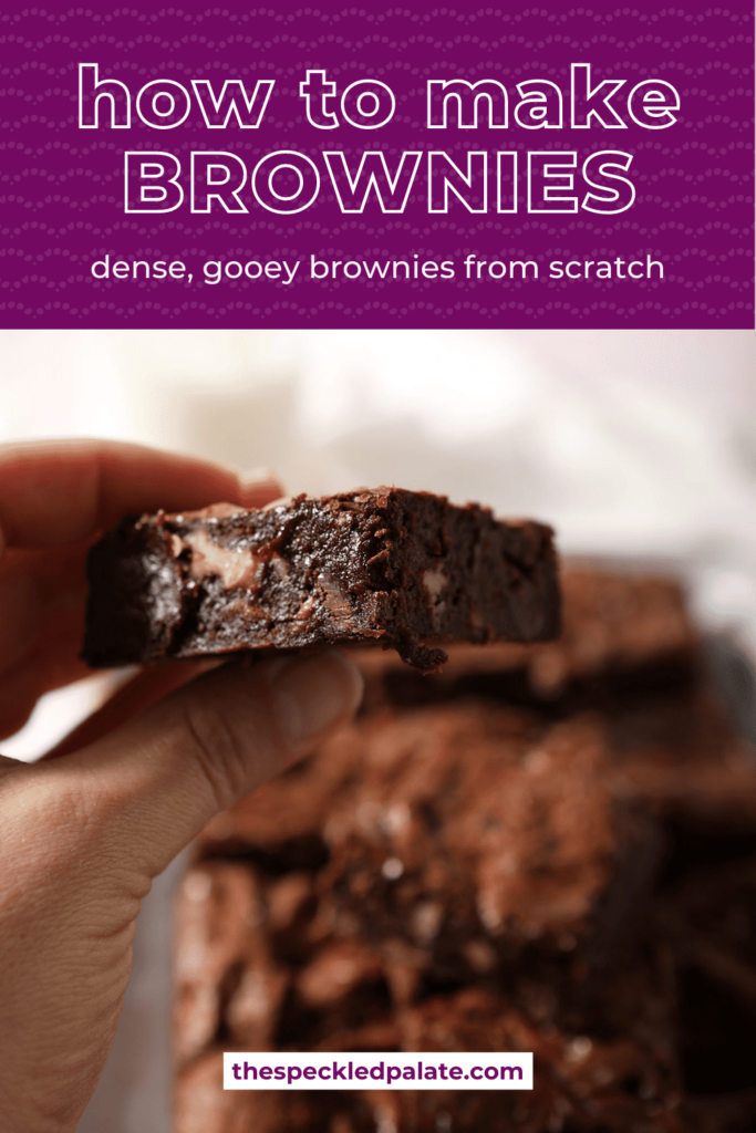 A hand holds a brownie over a plate with the text how to make brownies dense, gooey brownies from scratch