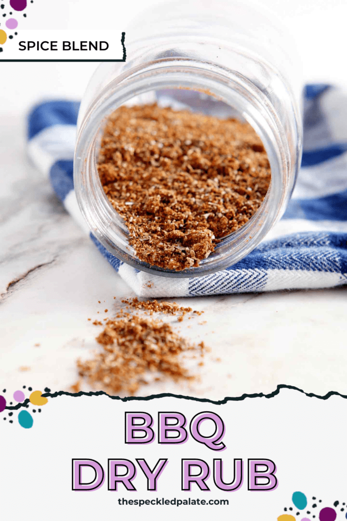 a mason jar of bbq rub spills out onto a marble surface while sitting on a blue buffalo check napkin with the text bbq dry rub