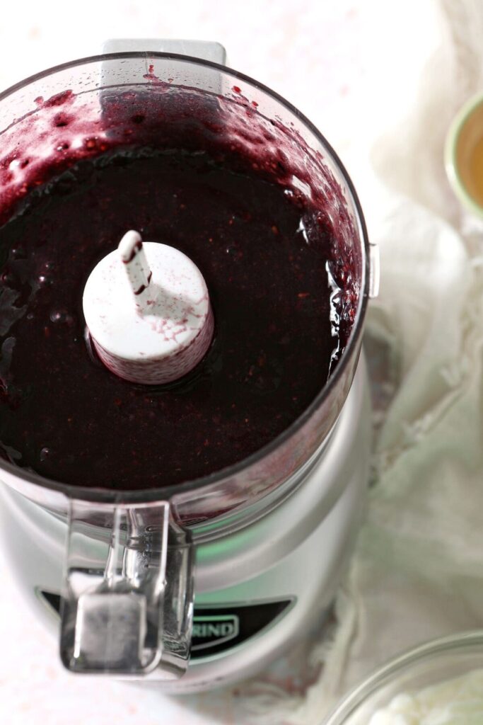 Blended strawberries and blackberries in a food processor