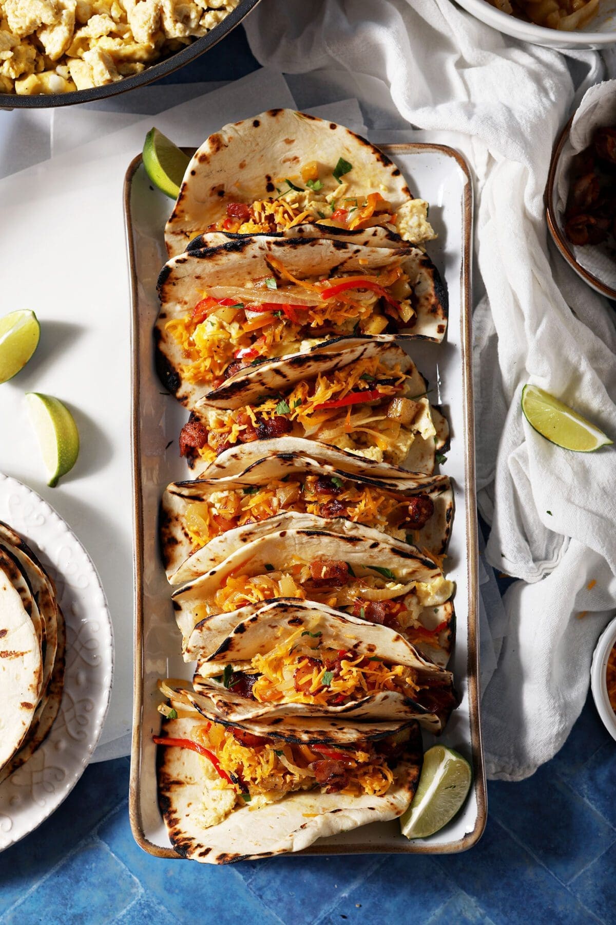 https://www.thespeckledpalate.com/wp-content/uploads/2013/10/The-Speckled-Palate-Make-Ahead-Breakfast-Tacos-Photo.jpg