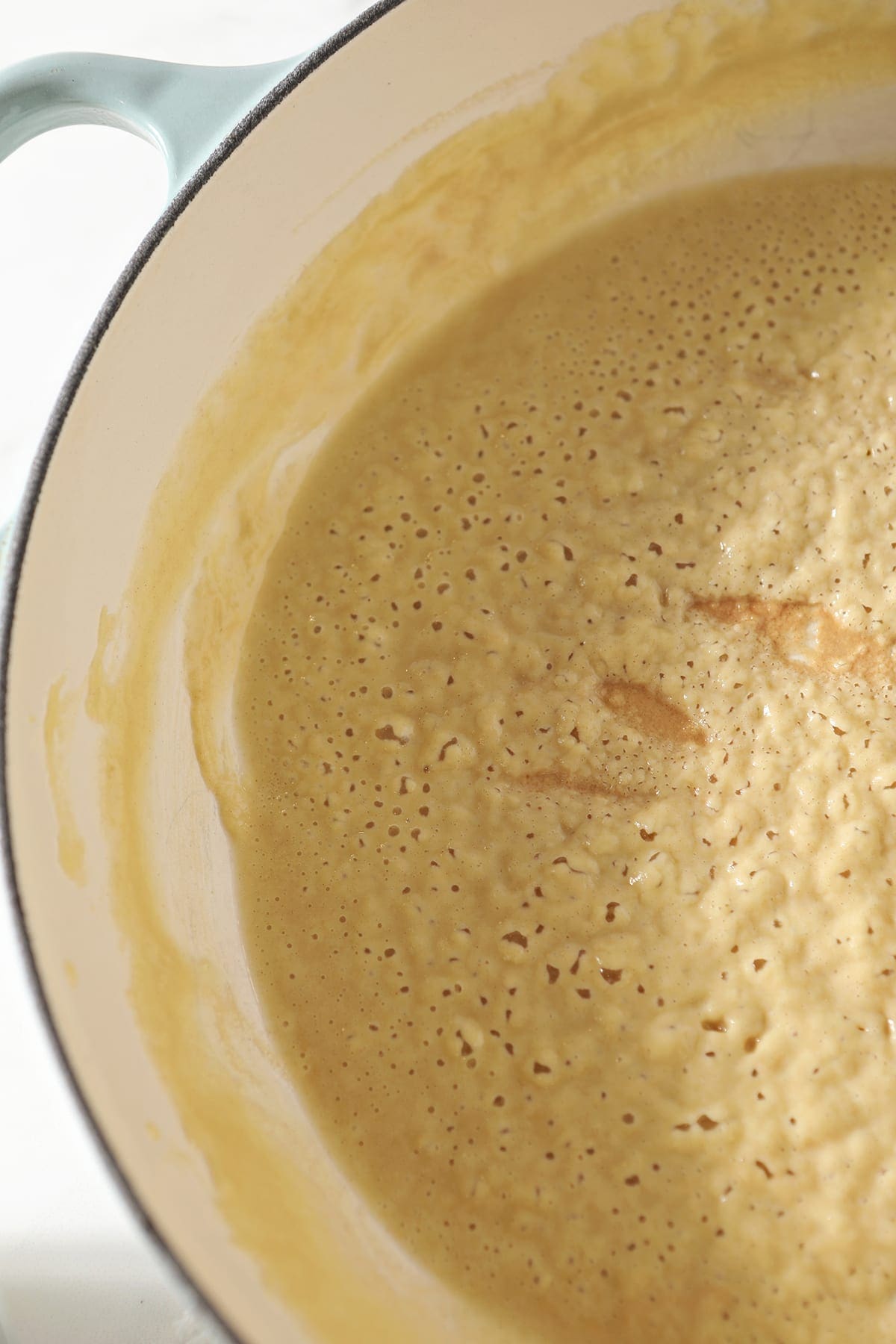 Close up of a blonde roux in a Dutch oven