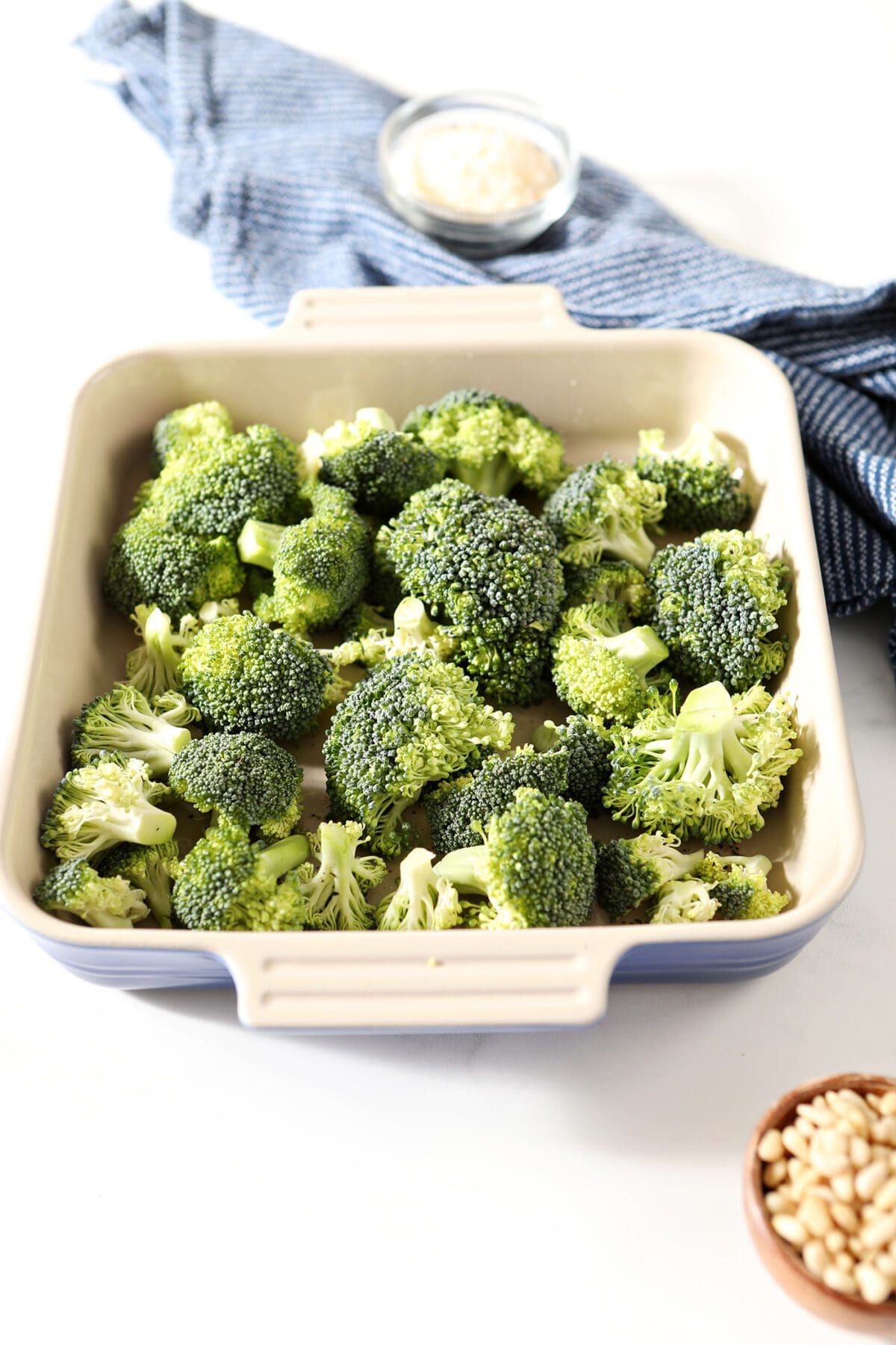 Broccoli in a baking dish before roasting