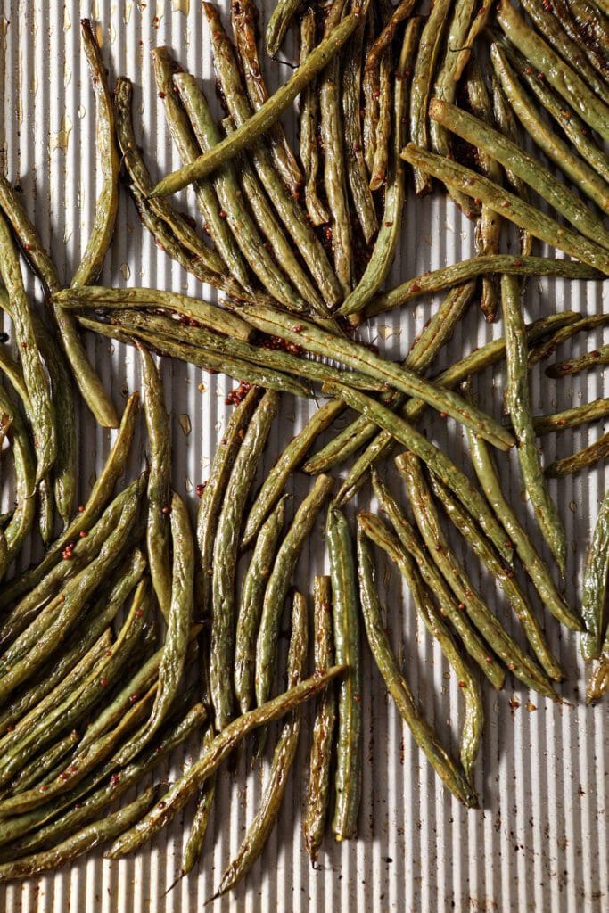 Green beans on a sheet pan, after roasting