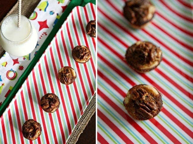 Angled views of bourbon pecan tassies on christmas platter