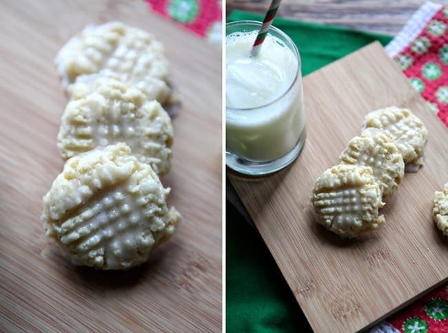 Vanilla bean shortbread cookies and glass of milk on wood board 