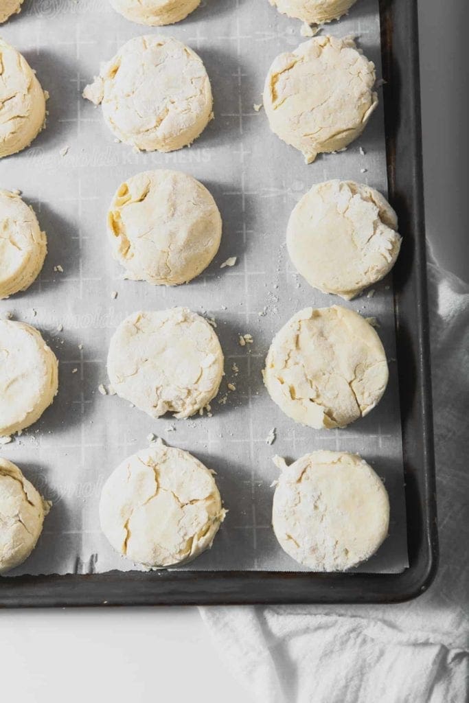 Cream Biscuits are lined on a baking sheet and ready to bake