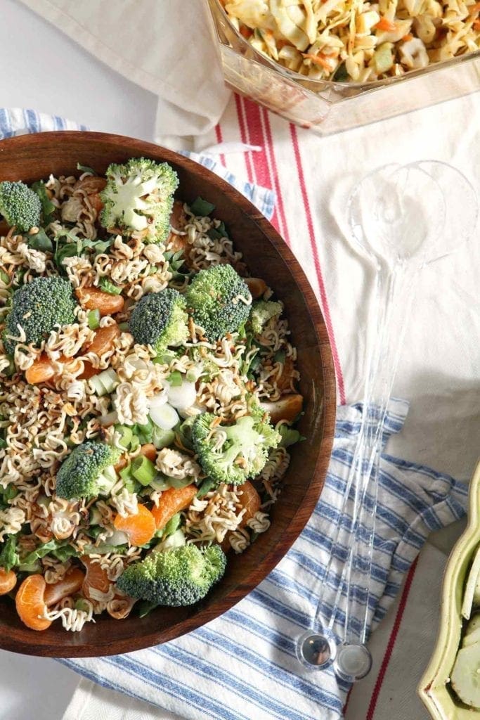 ramen noodle clementine salad in a brown bowl