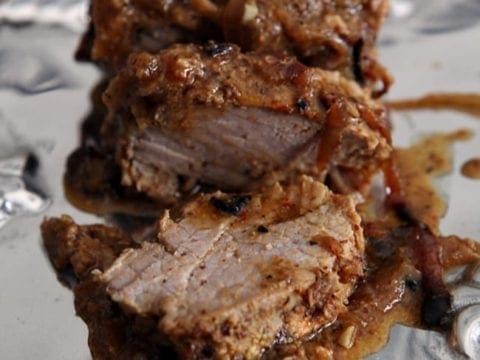 Pork tenderloin marinates in a mixture of olive oil, Worcestershire sauce, soy sauce, grainy mustard, hot sauce, apple cider vinegar and various spices to create the ultimate dinnertime juicy and tender protein. Leigh's Everything-but-the-Kitchen-Sink Pork Tenderloin is a household favorite!