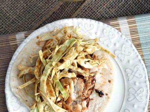 Overhead image of Soy Seared Cod Tacos on plate with spicy slaw 