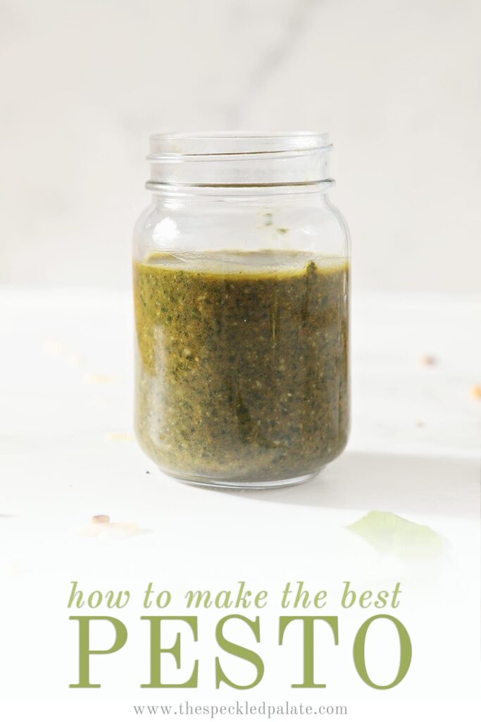 A jar of homemade pesto on marble with the text how to make the best pesto