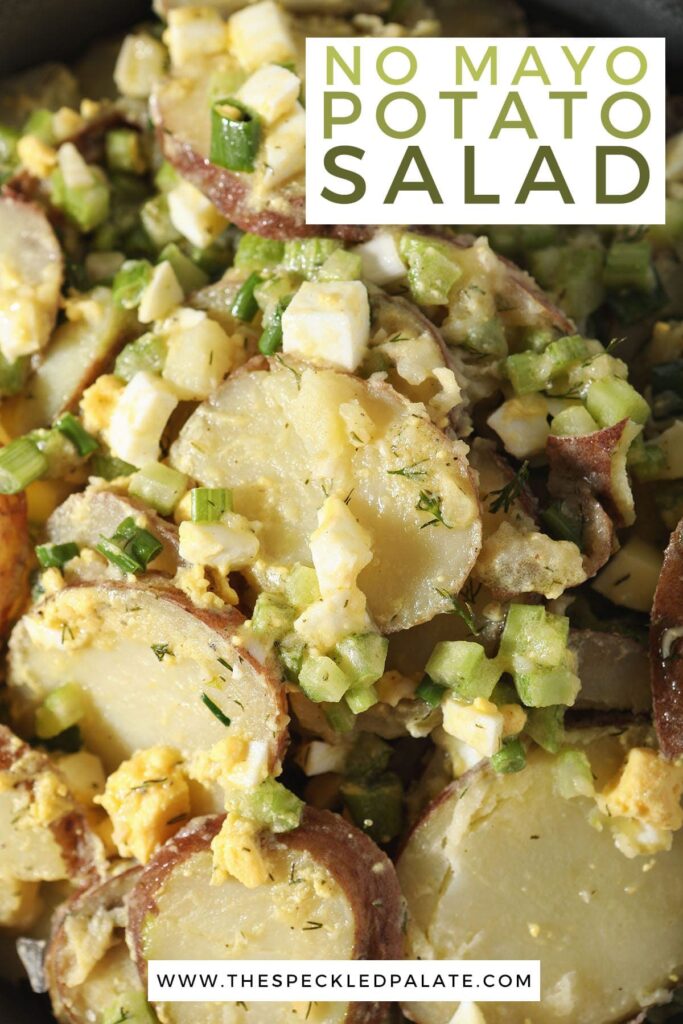 Potatoes with eggs, celery and dill in a bowl with the text no mayo potato salad