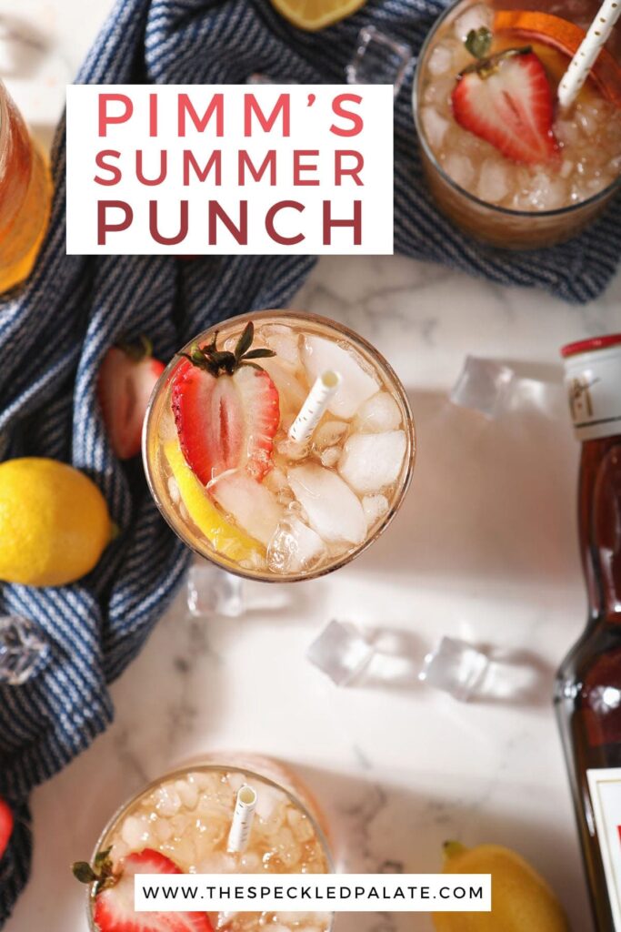 Three glasses of a fruit punch drink on marble with the text pimm's summer punch