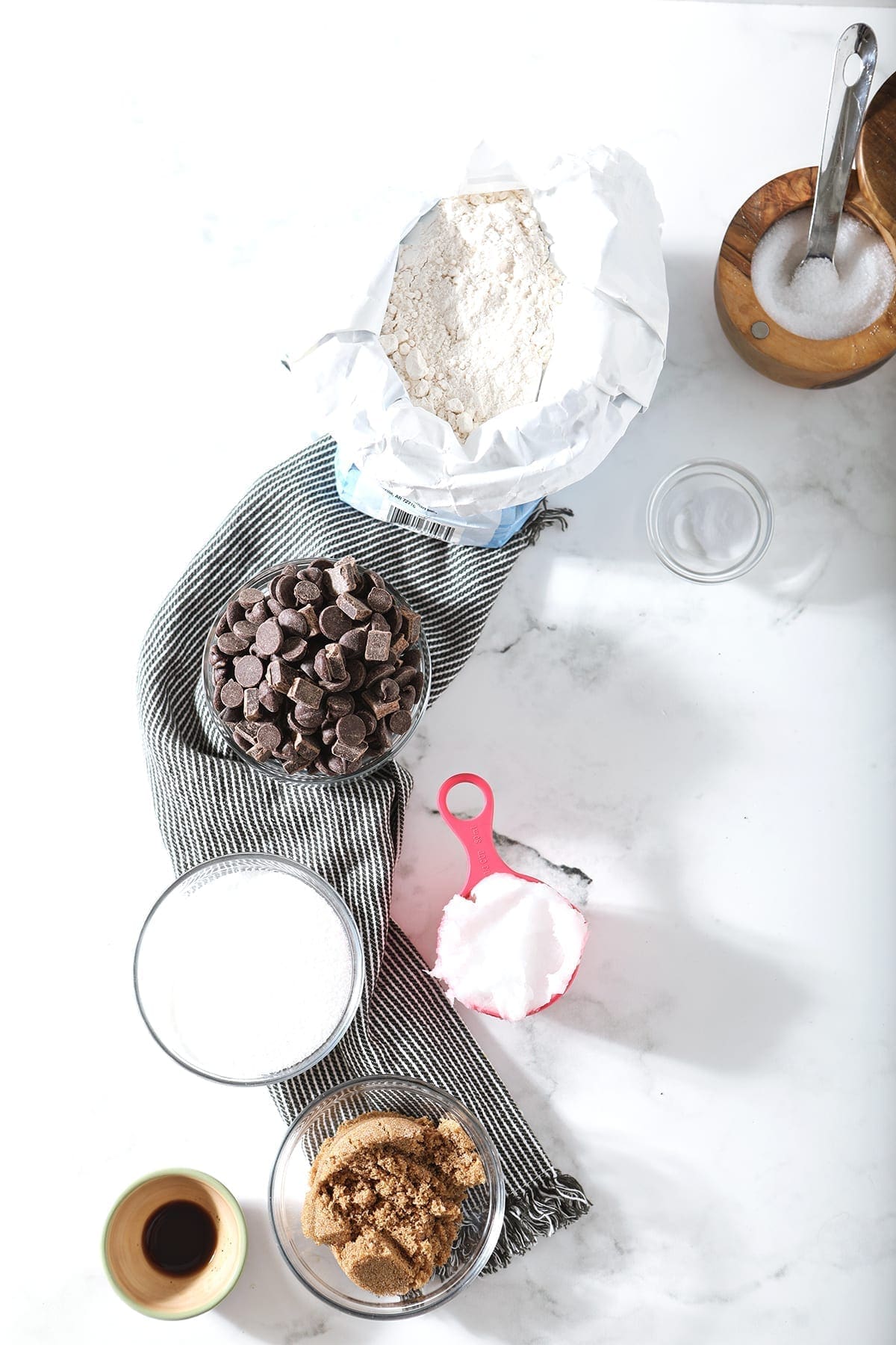 Ingredients for cookies, shown from above on a marble surface