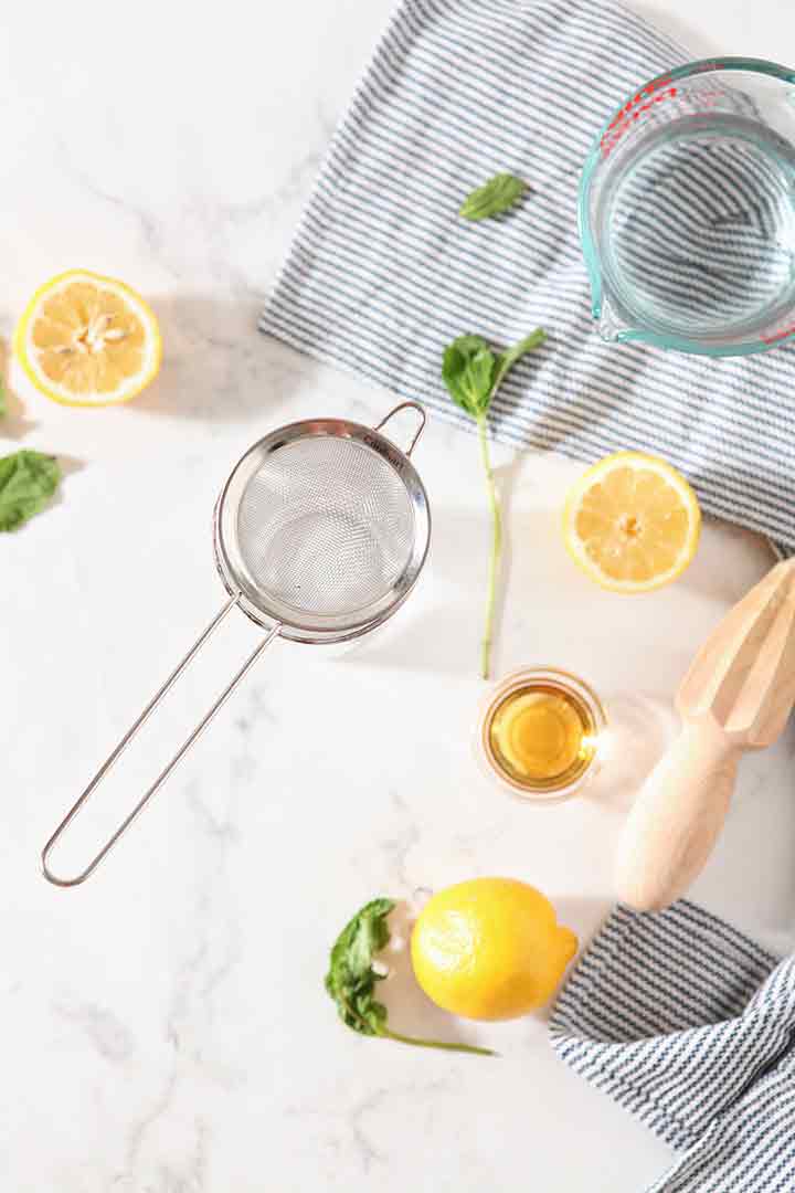 Ingredients and tools for the summer mocktail are shown from above