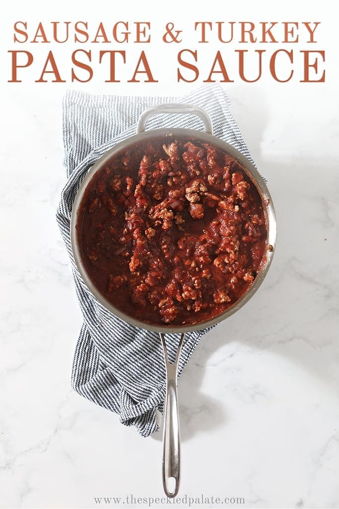 Overhead of a skillet full of marinara sauce, with Pinterest text