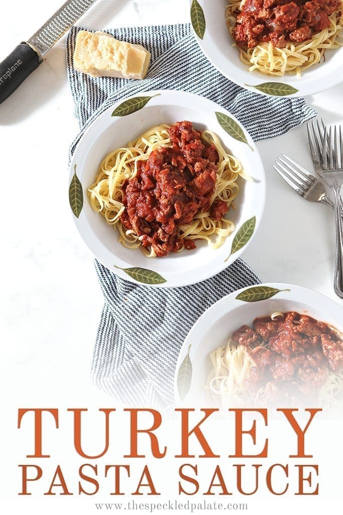 Overhead of three bowls of Turkey Pasta Sauce, with Pinterest text