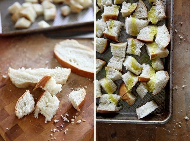 Preparing cubes of bread to be baked on sheet 