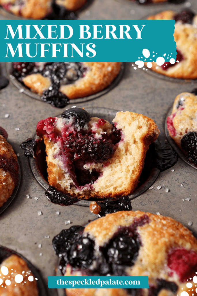 Triple Berry Muffins in a muffin tin with one halved with the text mixed berry muffins