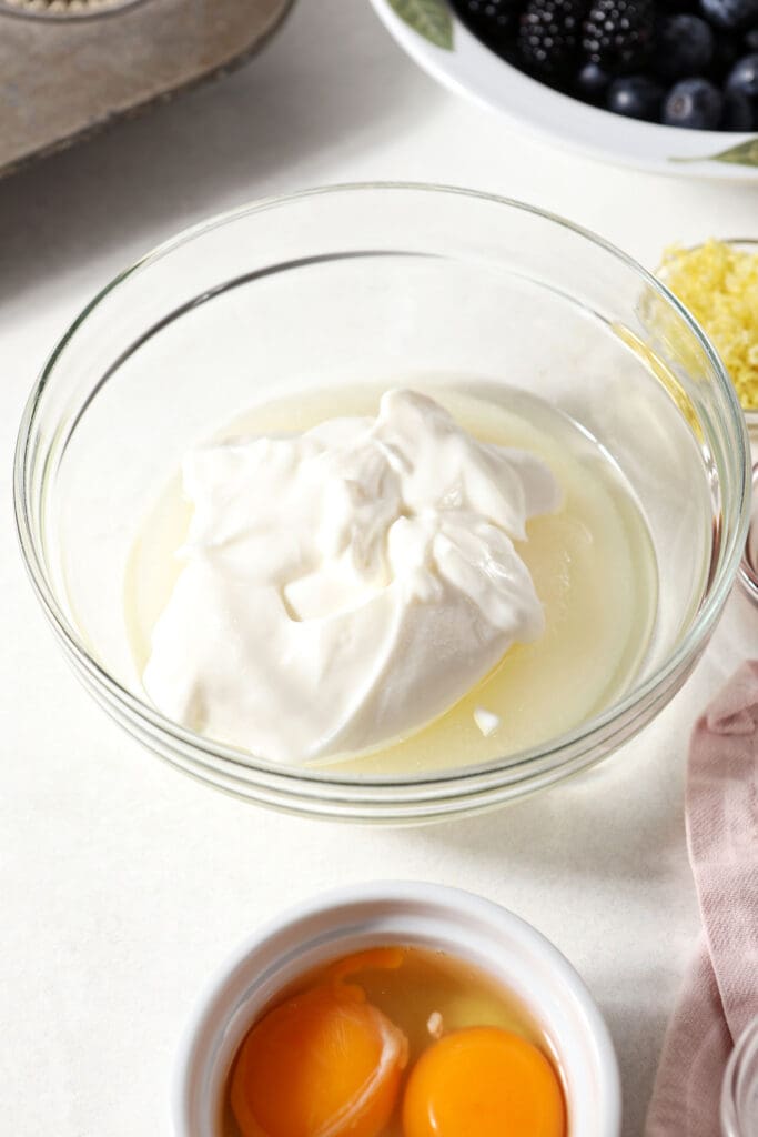 Sour cream and oil in a bowl before mixing