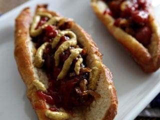 Hot Dogs with Caramelized Onions and Pretzel Buns