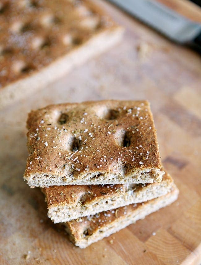 Whole Wheat Italian Focaccia stacked on wood board 