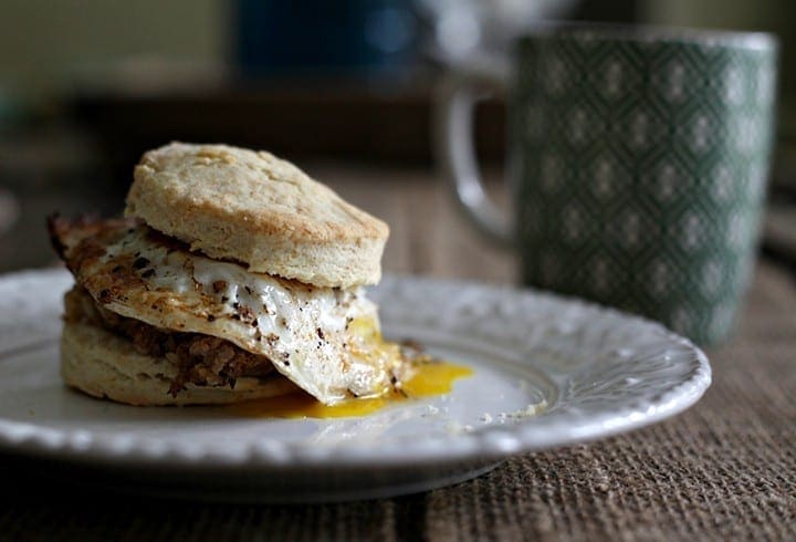 Boudin Egg Breakfast Sandwich on white plate