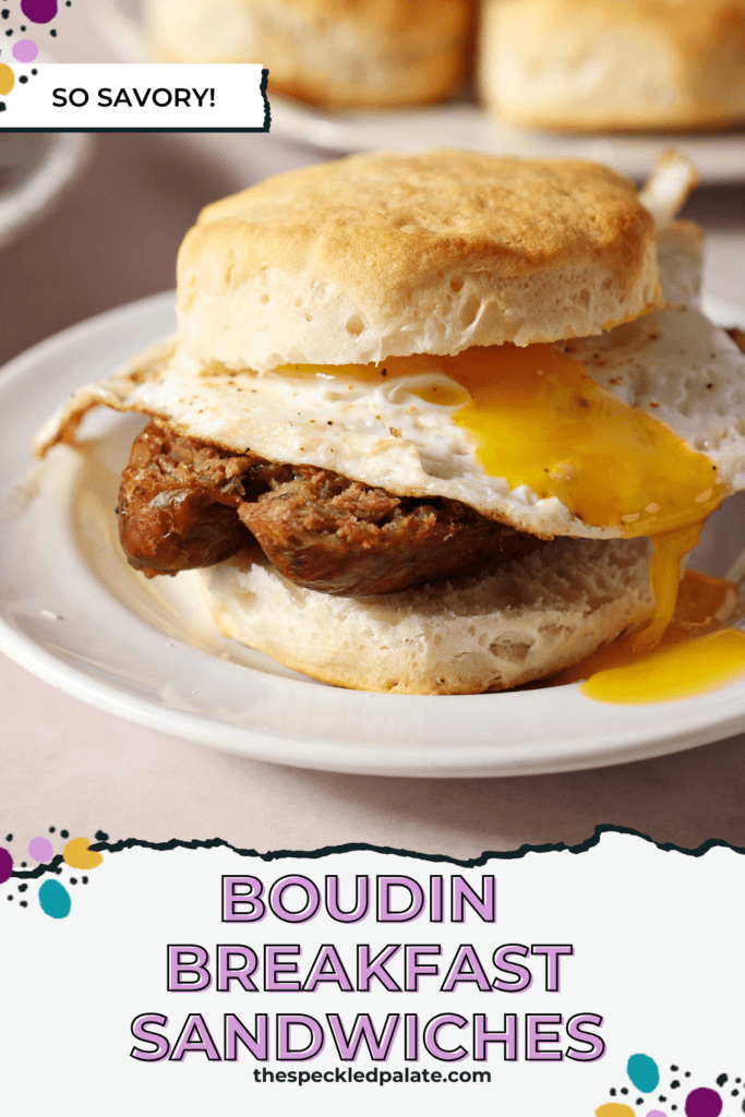 Egg yolk drops off a biscuit sandwich with boudin on a white plate with the text boudin breakfast sandwiches