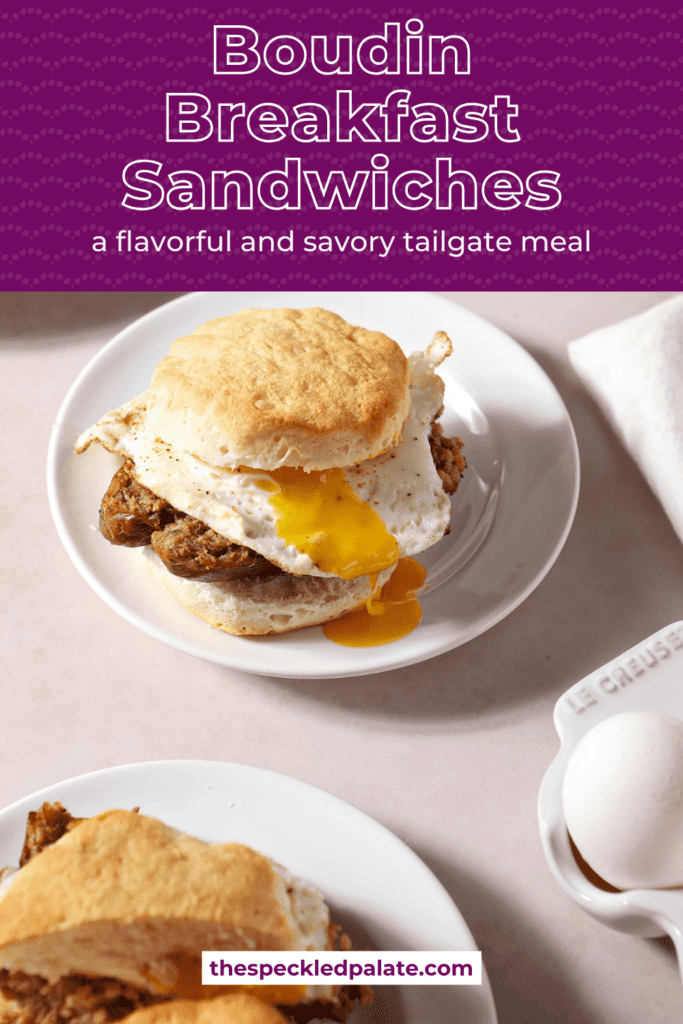 Two breakfast sandwiches on biscuits with a fried egg on white plates with the text boudin breakfast sandwiches a flavorful and savory tailgate meal