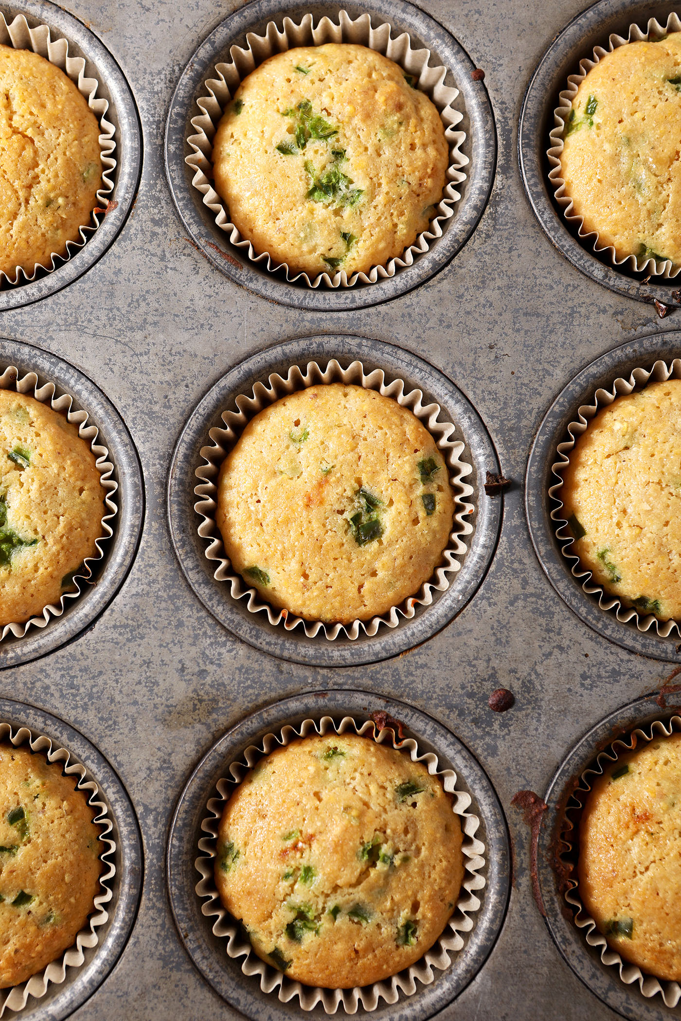Honey Jalapeno Cornbread Muffins in a tin after baking