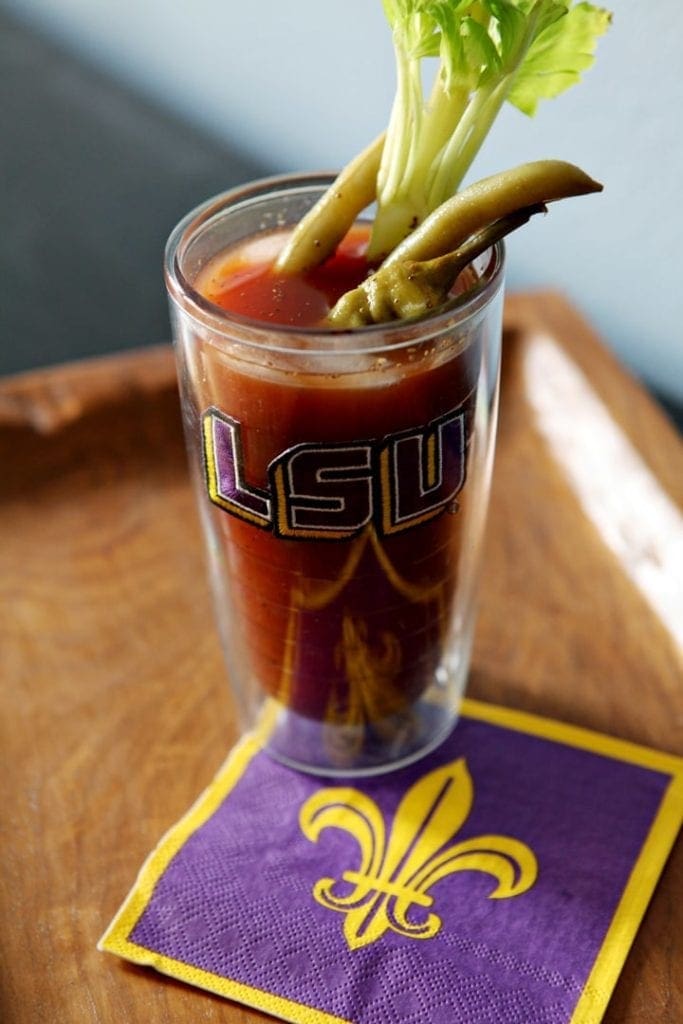 Glass of bloody maria on napkin 