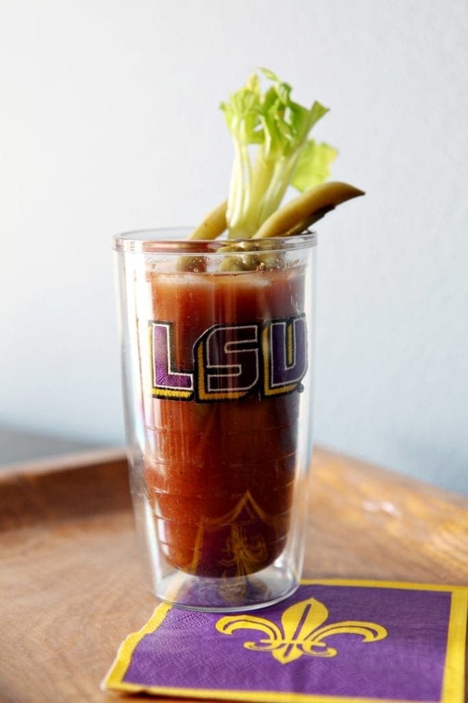 Glass of bloody maria on napkin 